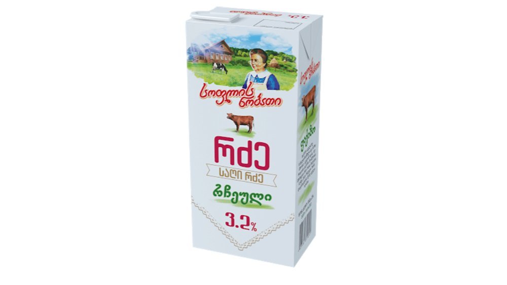 Village milk 3.2% (950 g)